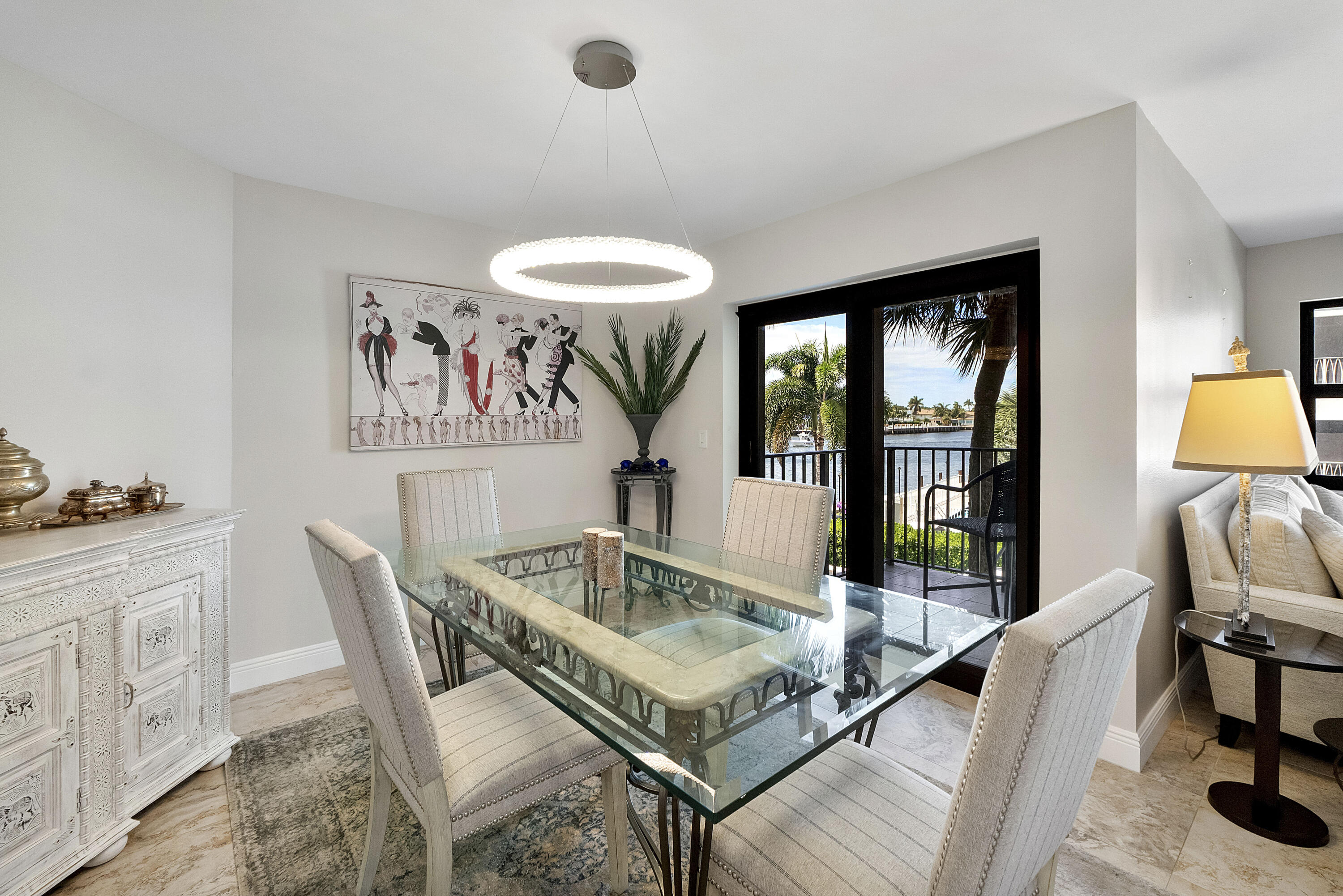501 North Riverside Drive, Unit 203 Pompano Beach, FL 33062 - Photo 25 of 35 a living room with furniture and a large window