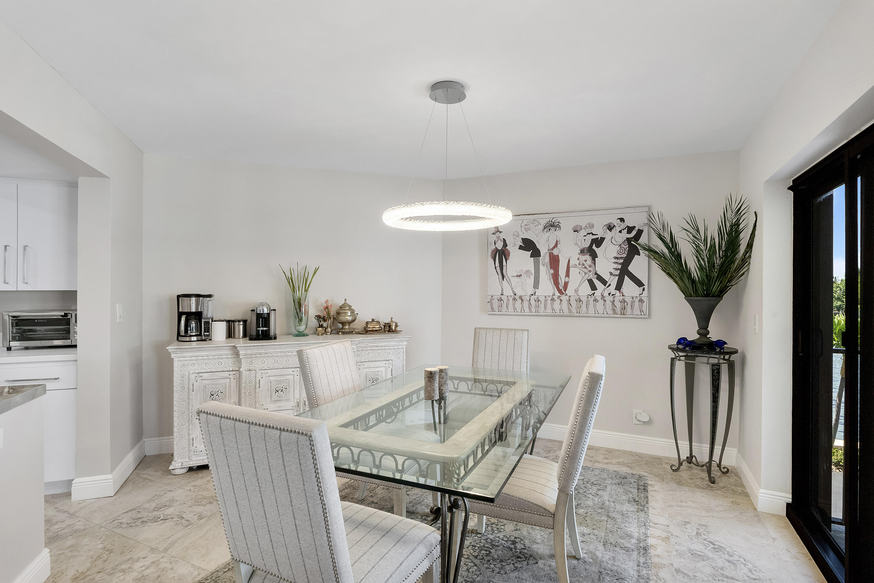 501 North Riverside Drive, Unit 203 Pompano Beach, FL 33062 - Photo 27 of 35 a view of a dining room with furniture