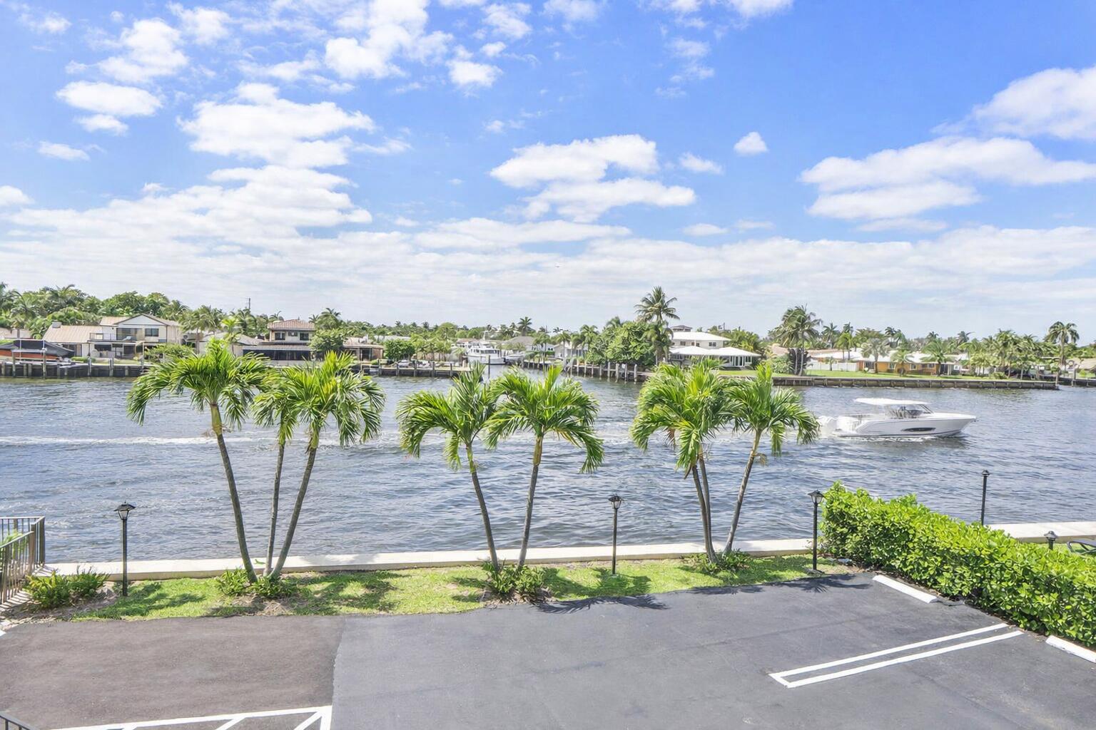 501 North Riverside Drive, Unit 203 Pompano Beach, FL 33062 - Photo 35 of 35 a view of a street with a yard