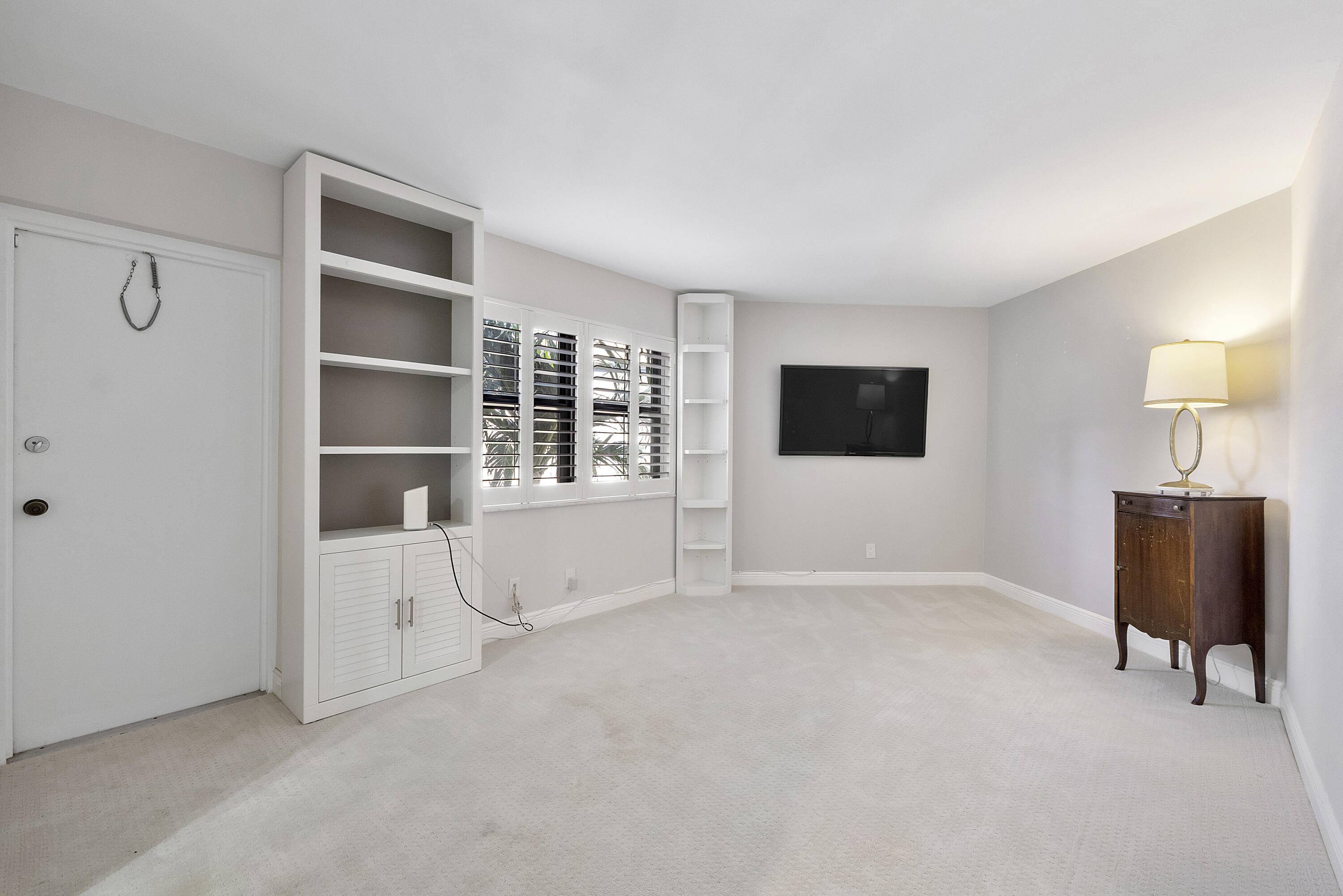 501 North Riverside Drive, Unit 203 Pompano Beach, FL 33062 - Photo 10 of 35 a view of a livingroom with furniture and cabinet