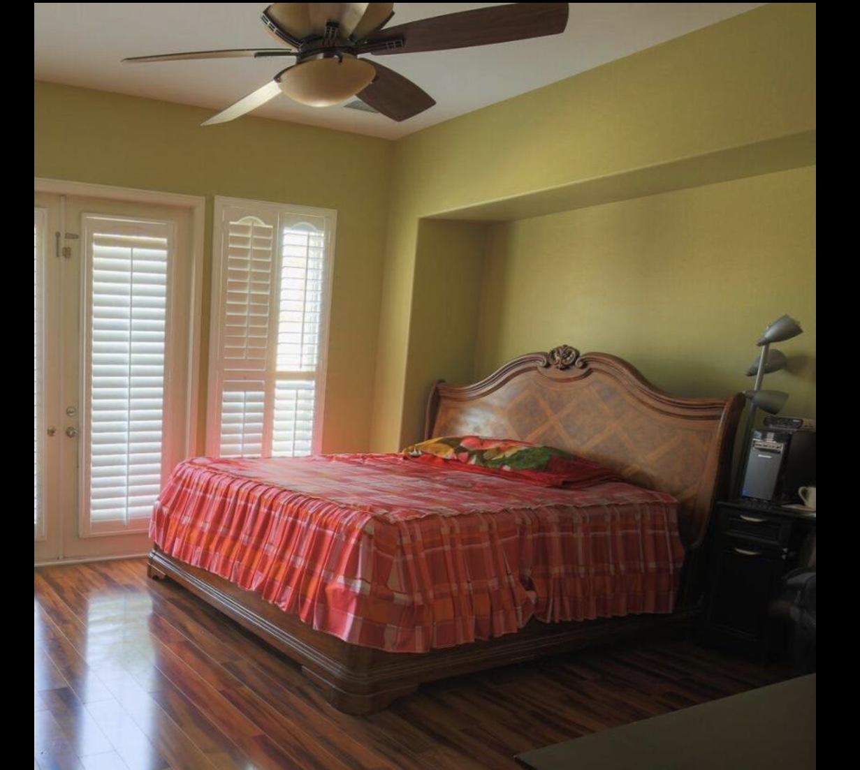 62 Victor Hugo Road Rancho Mirage, CA 92270 - Photo 13 of 14 a bedroom with a bed and window