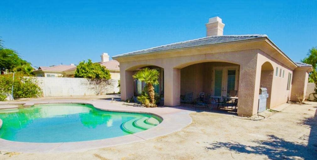 62 Victor Hugo Road Rancho Mirage, CA 92270 - Photo 4 of 14 a view of a house with yard and plants