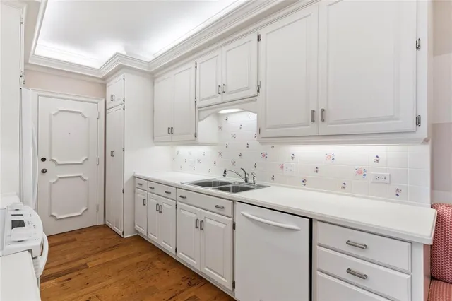 a utility room with cabinets