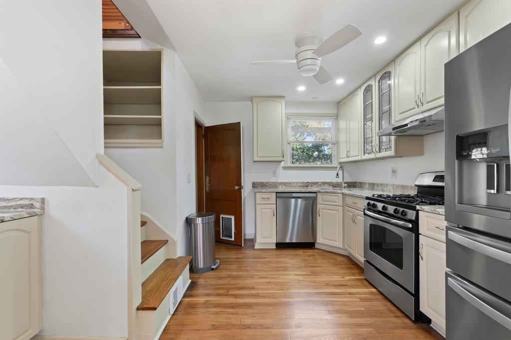 339 Center Road Monroeville, PA 15146 - Photo 12 of 43 Renovated Kitchen features Stainless Steel Appliances, Creamy White Cabinets with a gorgeous granite counter top.