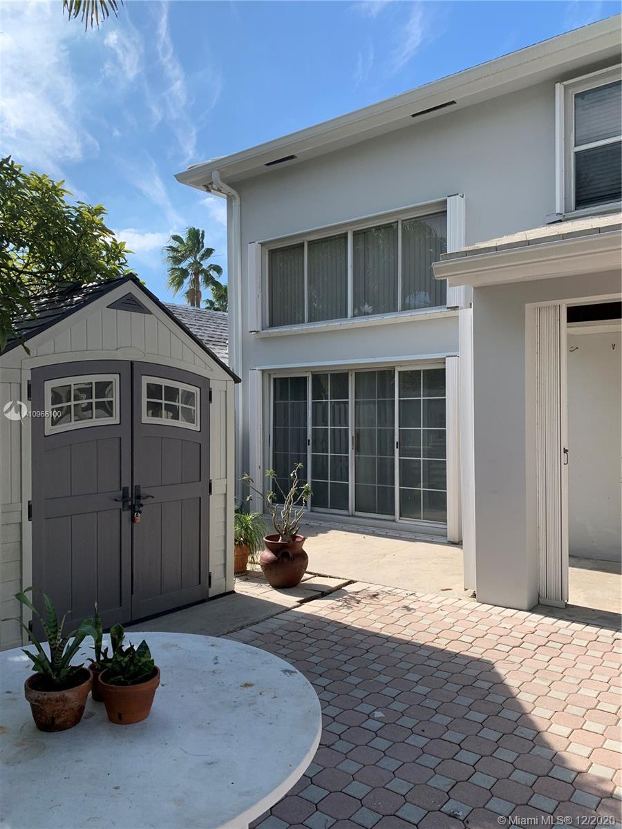 4753 Southwest 154th Court Miami, FL 33185 - Photo 17 of 27 Master bedroom upstairs with seating / desk area. Look at the space and how bright it is.