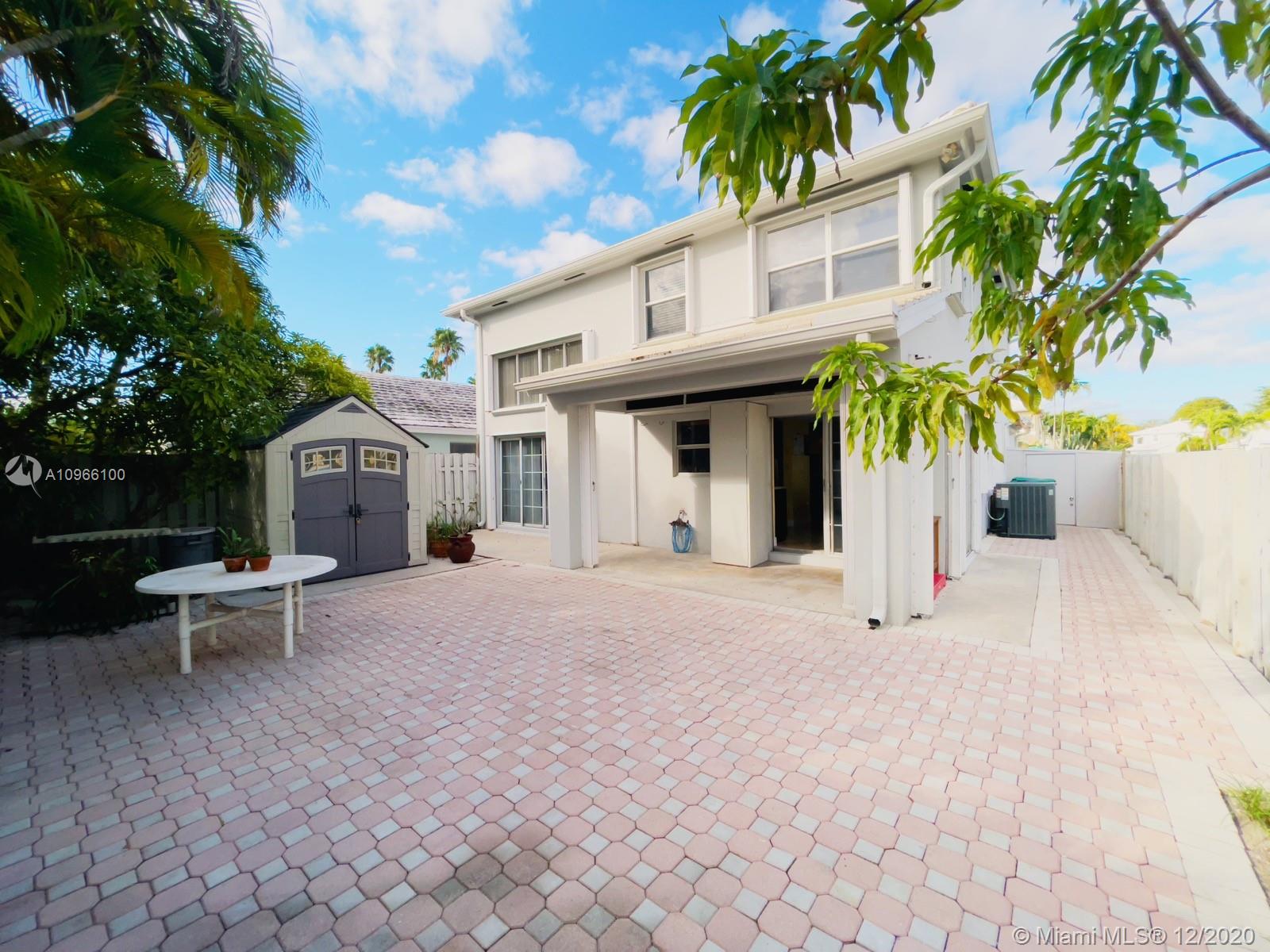 4753 Southwest 154th Court Miami, FL 33185 - Photo 22 of 27 Did you notice the accordion shutters and pavers on this corner patio? very easy to maintain. The shed will help you to keep gardening tools and patio items stored.