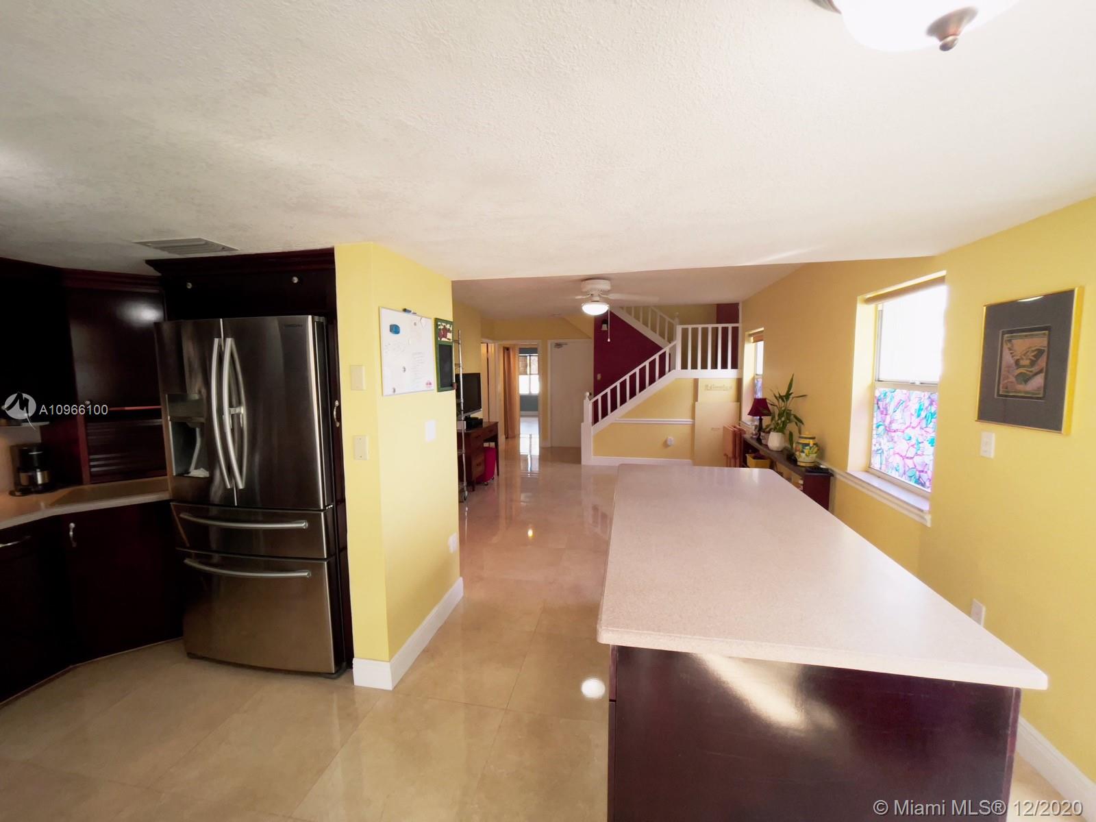 4753 Southwest 154th Court Miami, FL 33185 - Photo 6 of 27 Huge movable kitchen island with extra counter and storage space.