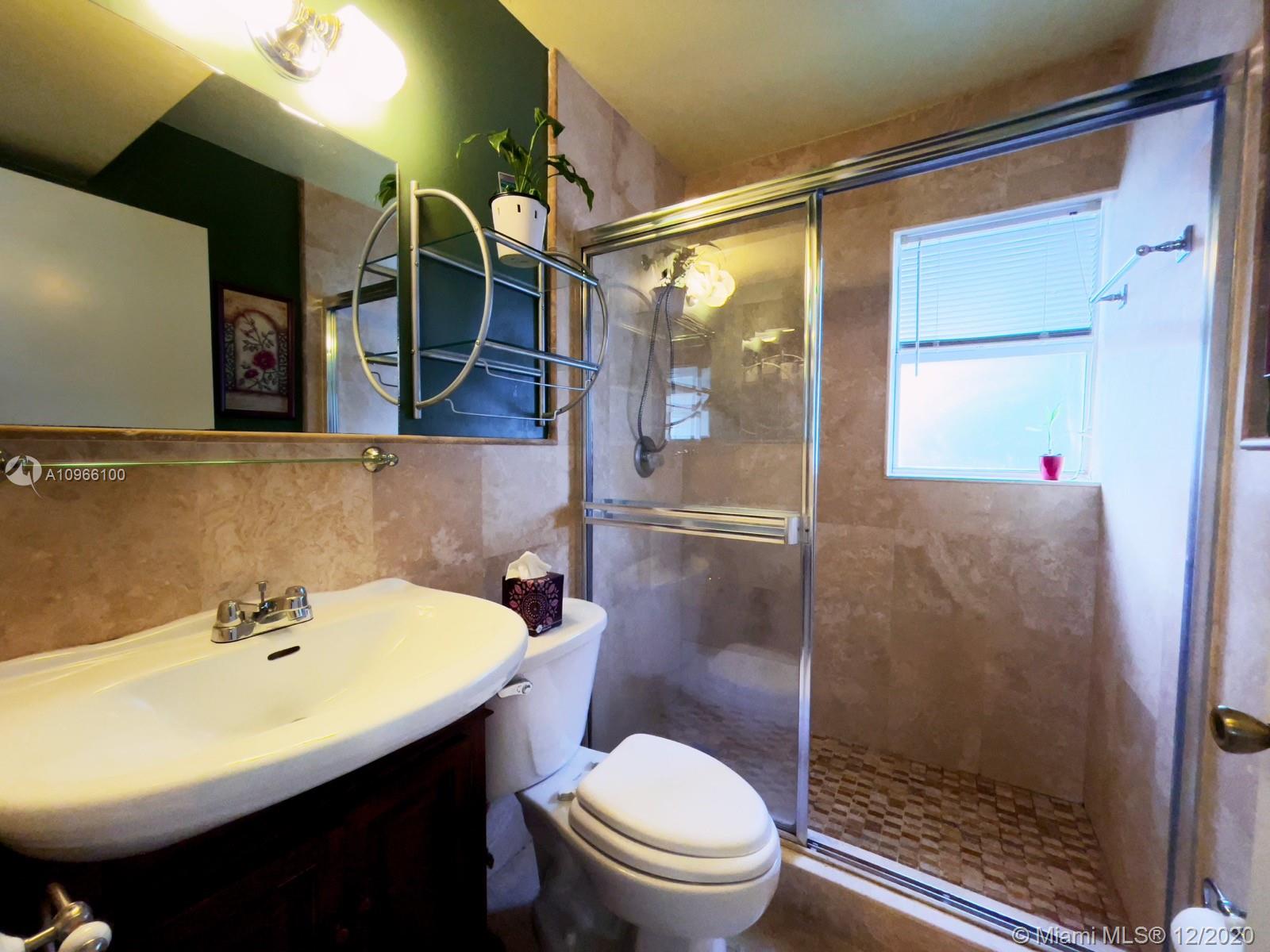 4753 Southwest 154th Court Miami, FL 33185 - Photo 10 of 27 Updated full bathroom on first floor.