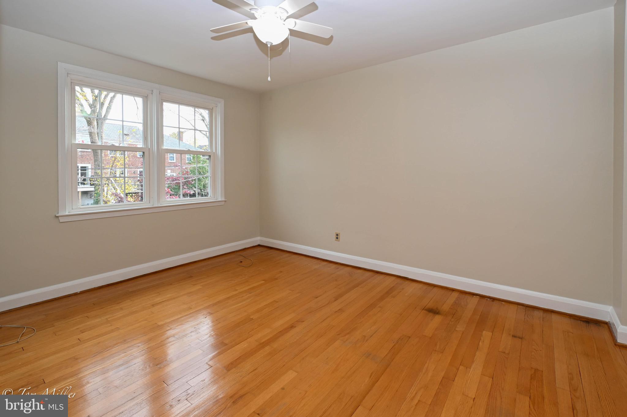 127 Stanmore Road Baltimore, MD 21212 - Photo 19 of 37 Bedroom #2 (middle) with Hardwood Floors