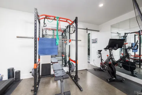 a view of a room with gym equipment