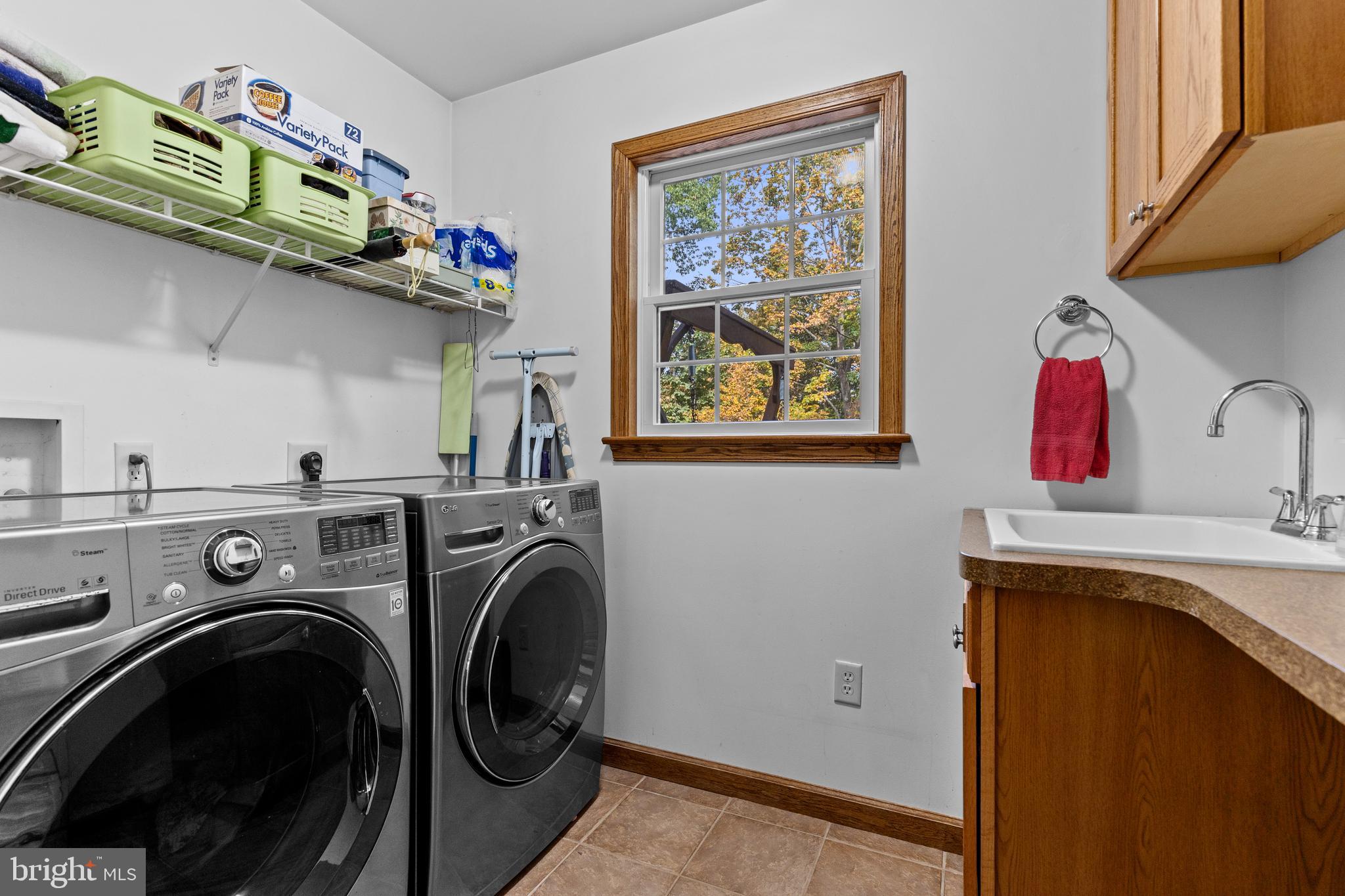14731 Shimpstown Road Mercersburg, PA 17236 - Photo 16 of 52 a utility room with dryer and washer