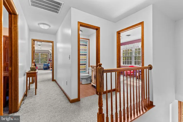 a bed room with a bed and a desk