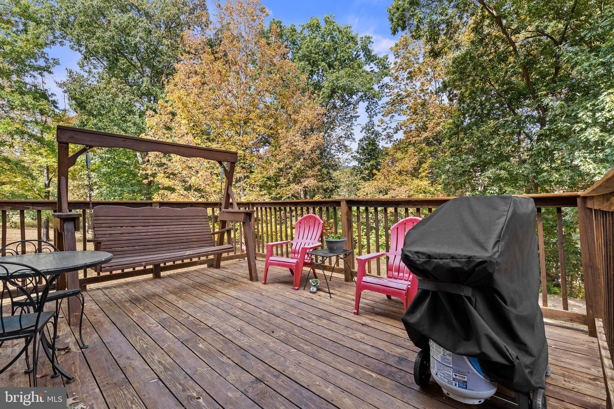 14731 Shimpstown Road Mercersburg, PA 17236 - Photo 32 of 52 an outdoor sitting area with furniture and wooden deck