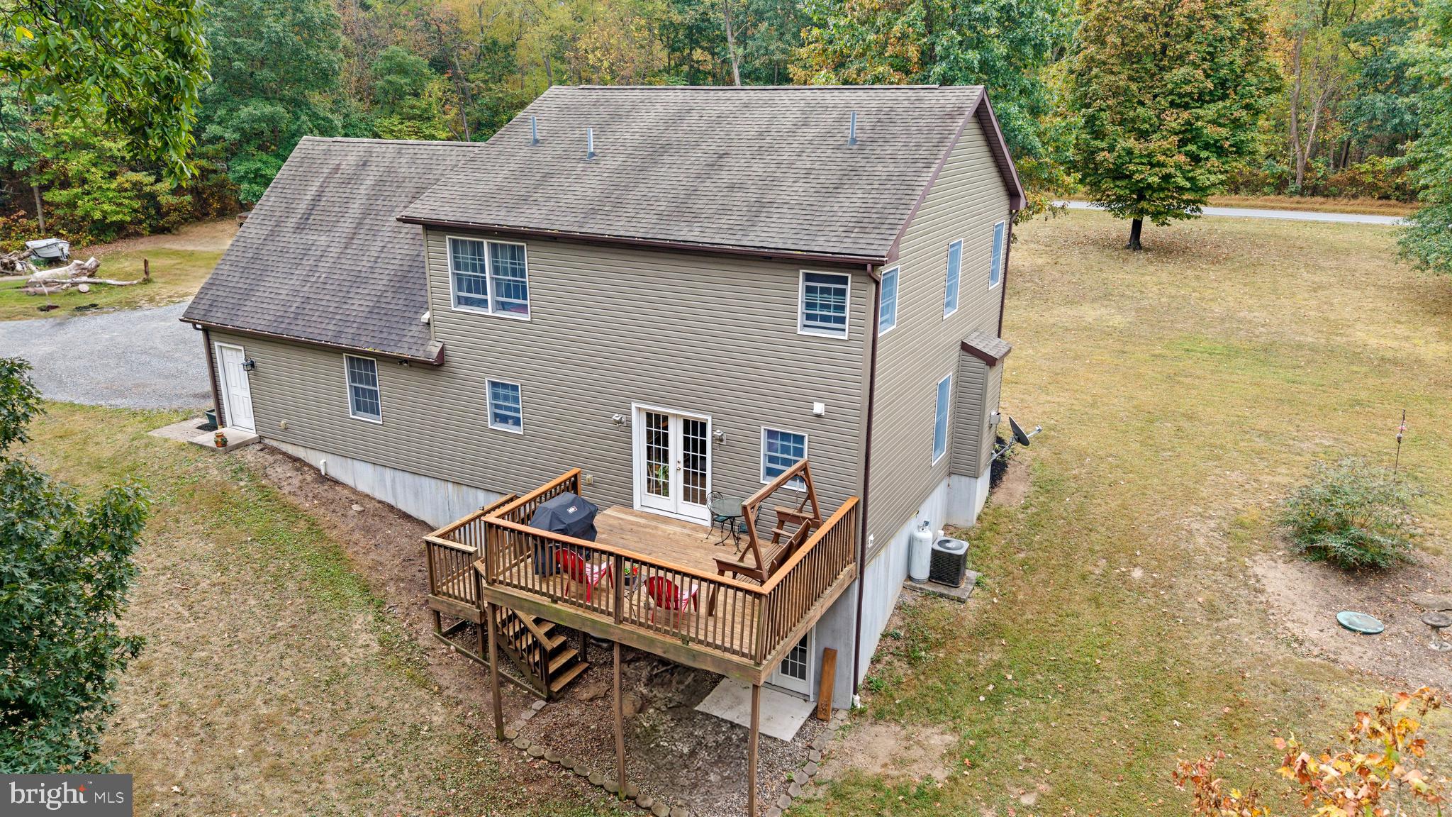 14731 Shimpstown Road Mercersburg, PA 17236 - Photo 40 of 52 a aerial view of a house with a yard and sitting space