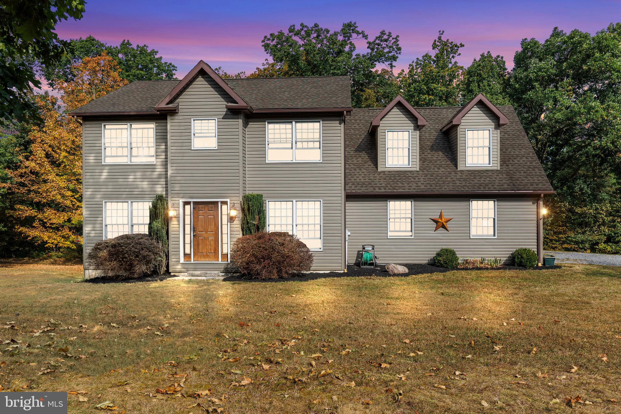 14731 Shimpstown Road Mercersburg, PA 17236 - Photo 4 of 52 a front view of a house with a yard