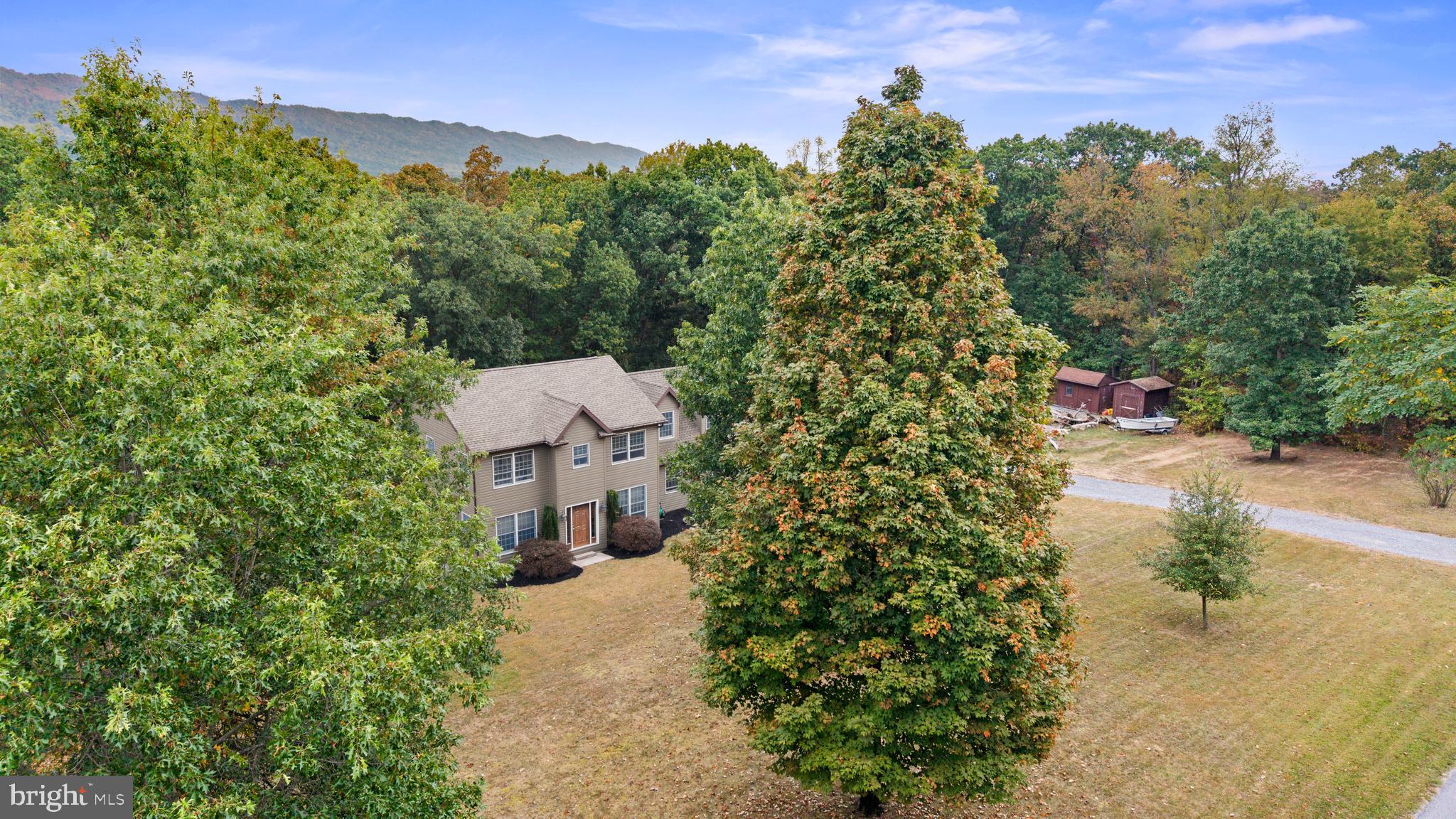 14731 Shimpstown Road Mercersburg, PA 17236 - Photo 41 of 52 a view of a street with a building in the background