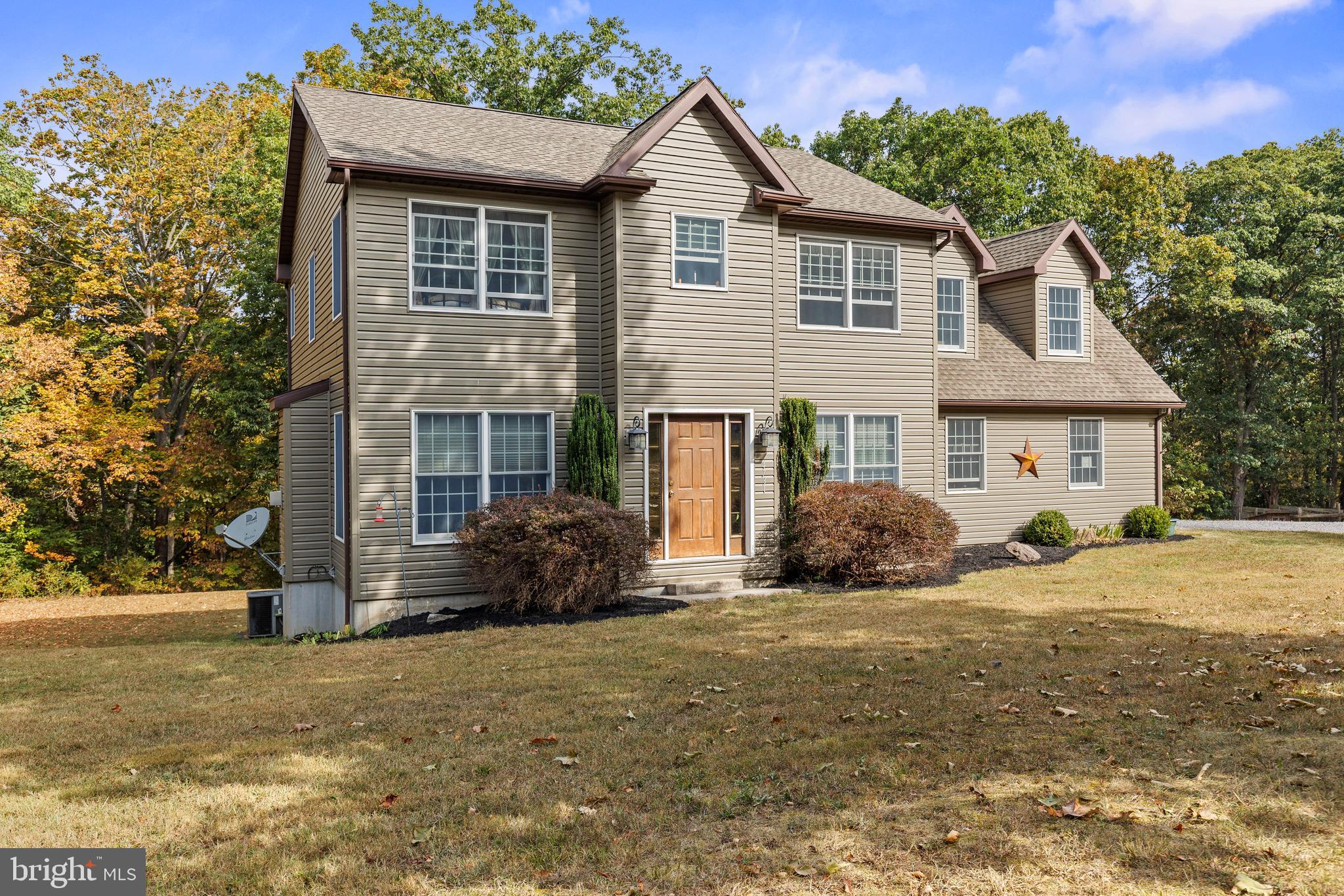 14731 Shimpstown Road Mercersburg, PA 17236 - Photo 6 of 52 a front view of a house with a yard