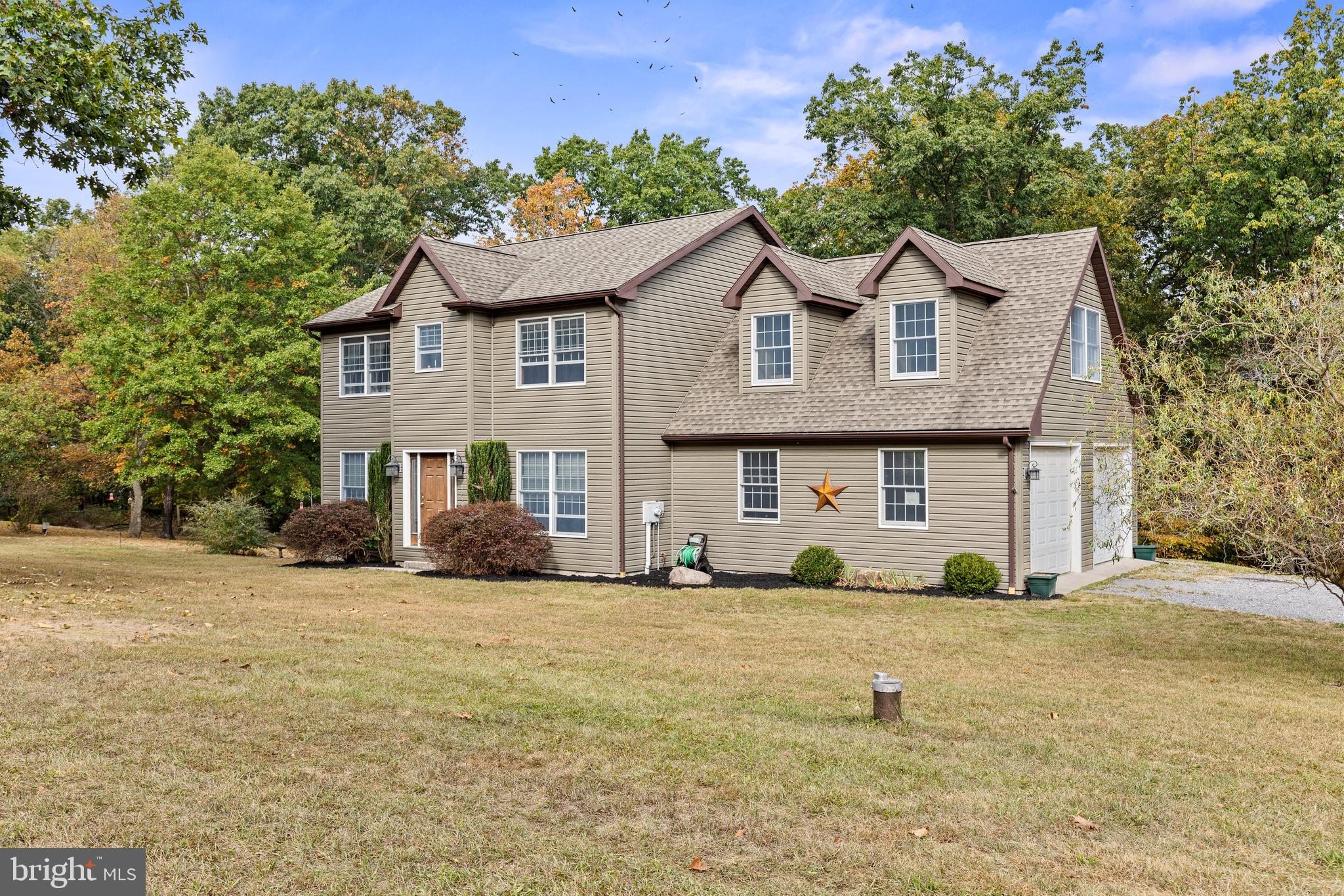 14731 Shimpstown Road Mercersburg, PA 17236 - Photo 7 of 52 a front view of a house with a yard