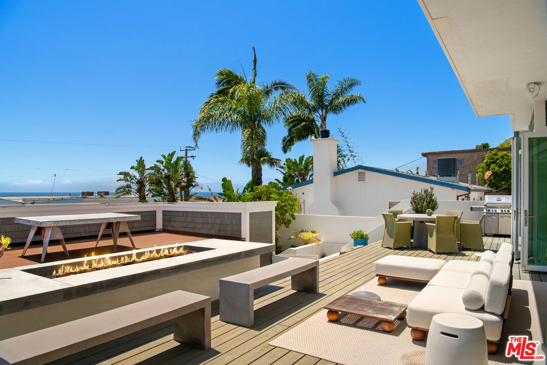 25157 Malibu Road Malibu, CA 90265 - Photo 25 of 33 a view of a swimming pool with furniture