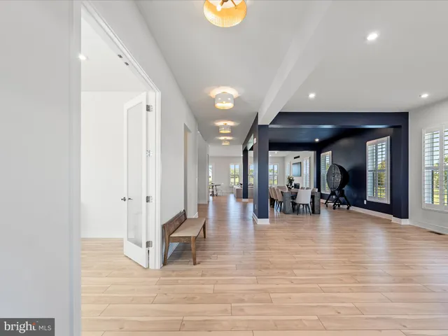 a workspace with furniture and wooden floor