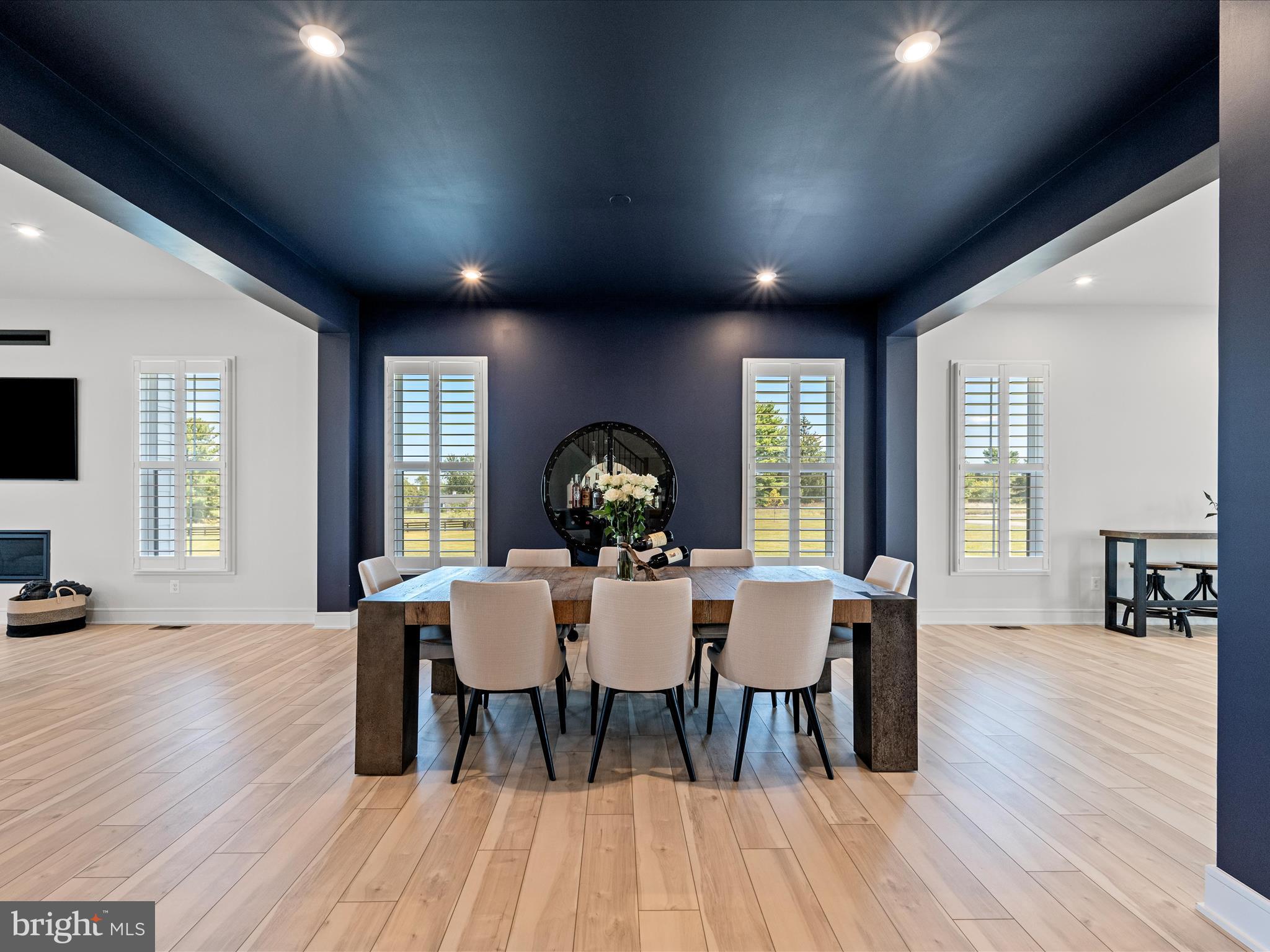 38906 Rumely Way Waterford, VA 20197 - Photo 20 of 99 a view of a dining room with furniture window and wooden floor