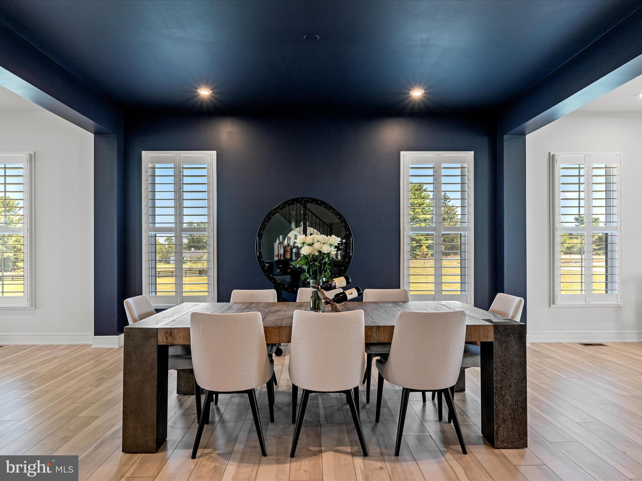 38906 Rumely Way Waterford, VA 20197 - Photo 21 of 99 a view of a dining room with furniture window and wooden floor
