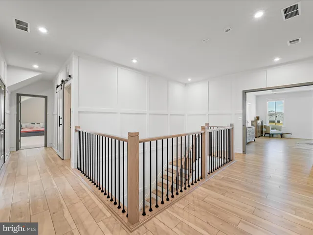 a view of a garage with parked cars