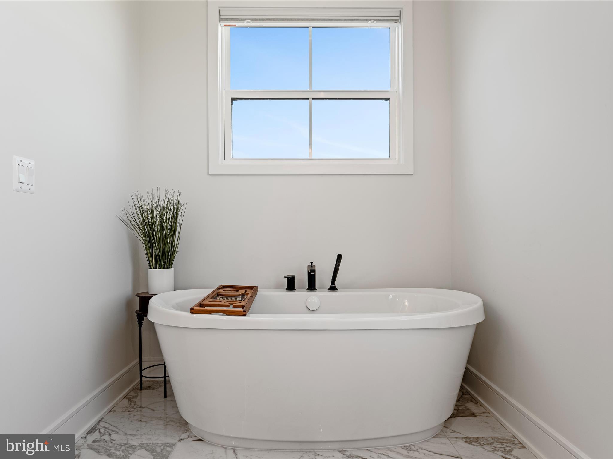 38906 Rumely Way Waterford, VA 20197 - Photo 47 of 99 a white bath tub sitting in a bathroom