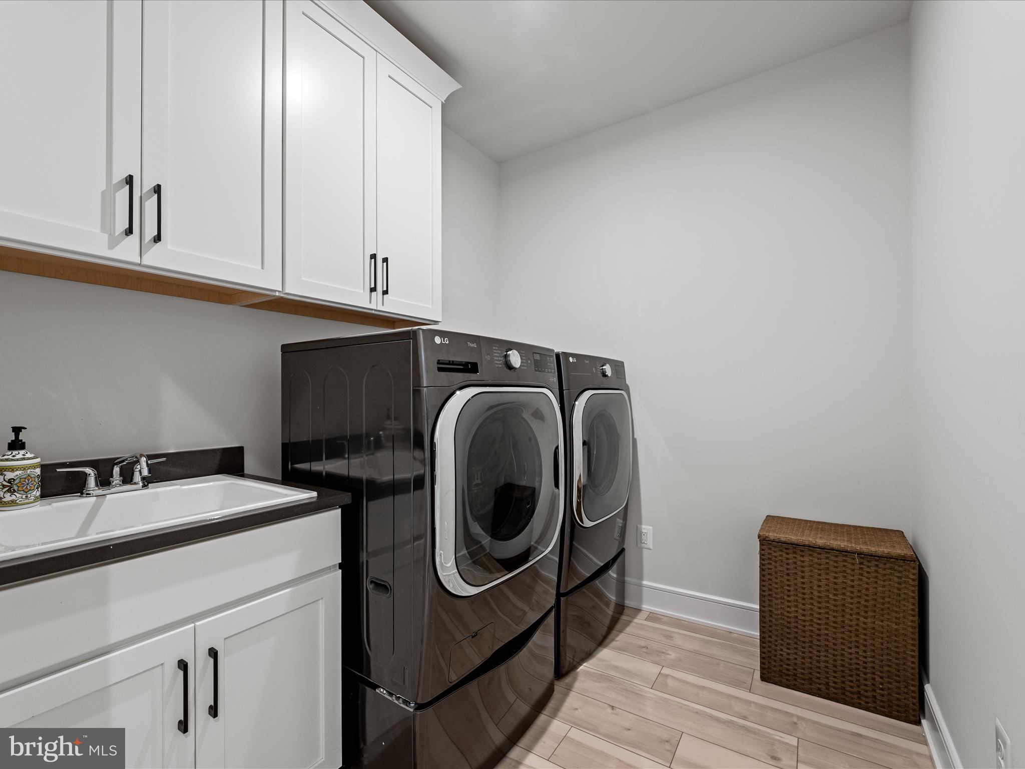 38906 Rumely Way Waterford, VA 20197 - Photo 62 of 99 a utility room with sink dryer and washer