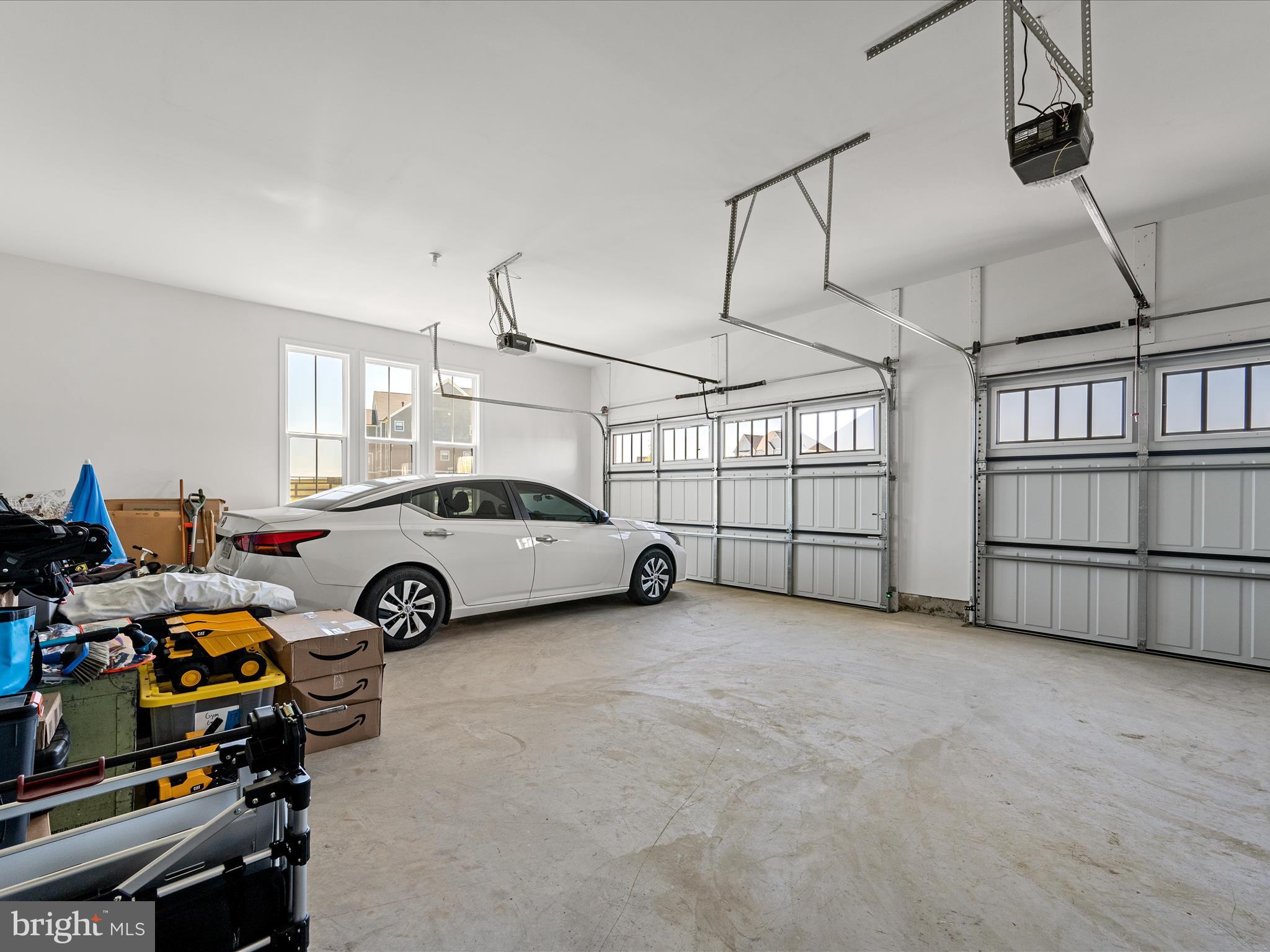38906 Rumely Way Waterford, VA 20197 - Photo 77 of 99 a view of a garage with parked cars