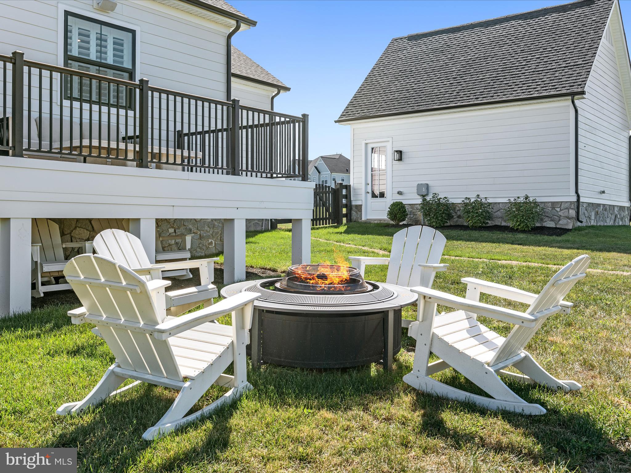 38906 Rumely Way Waterford, VA 20197 - Photo 85 of 99 a view of a house with backyard sitting area and swimming pool