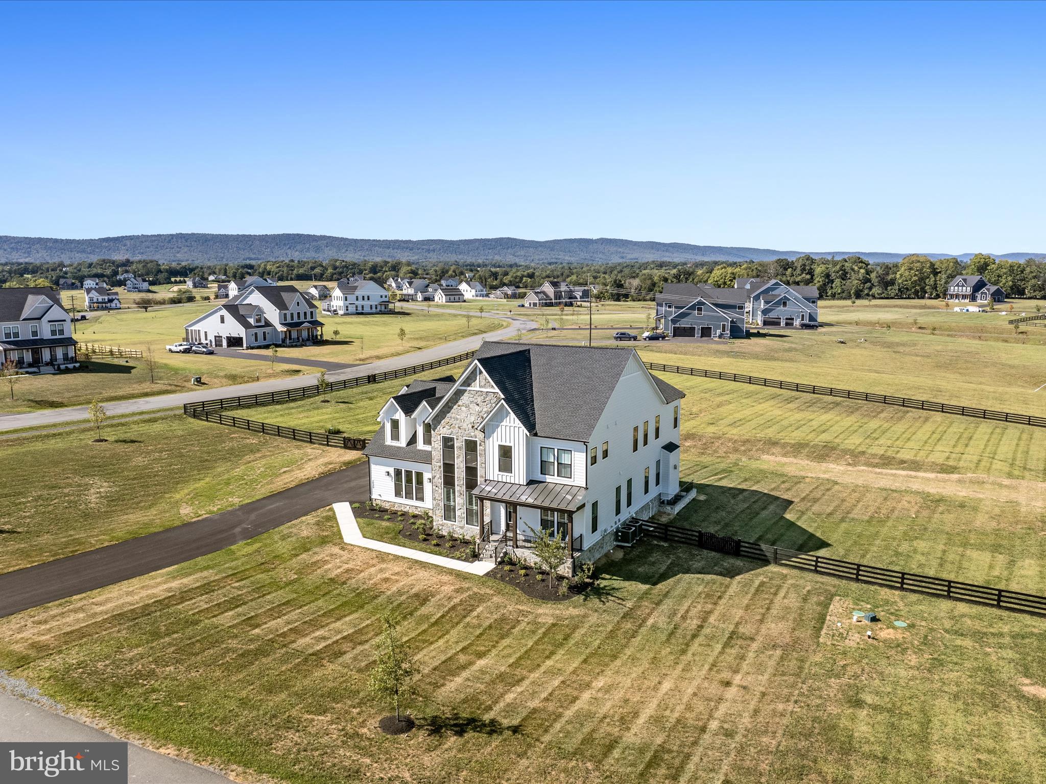 38906 Rumely Way Waterford, VA 20197 - Photo 89 of 99 a view of a lake with a nearby beach