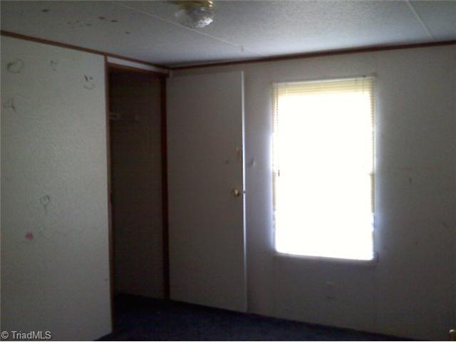 190 Flynt Road Liberty, NC 27298 - Photo 4 of 7 1st Bedroom.