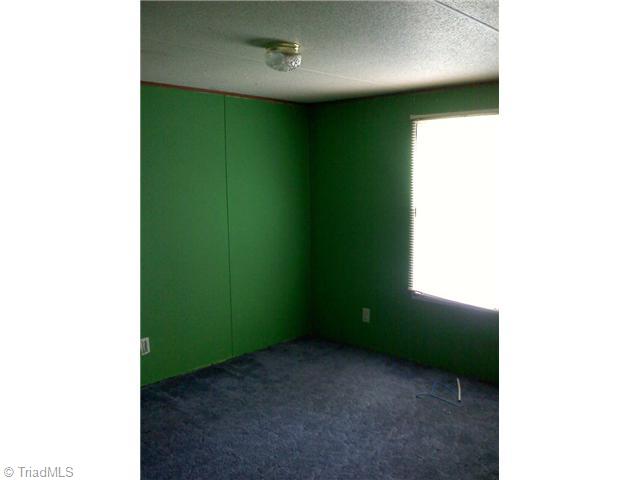 190 Flynt Road Liberty, NC 27298 - Photo 5 of 7 2nd Bedroom.