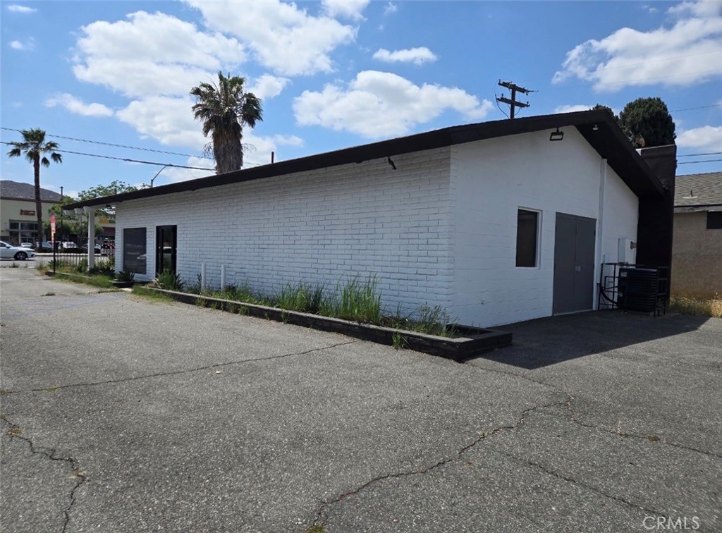 4943 La Sierra Avenue Riverside, CA 92505 - Photo 3 of 16 a couple of potted plants in front of building