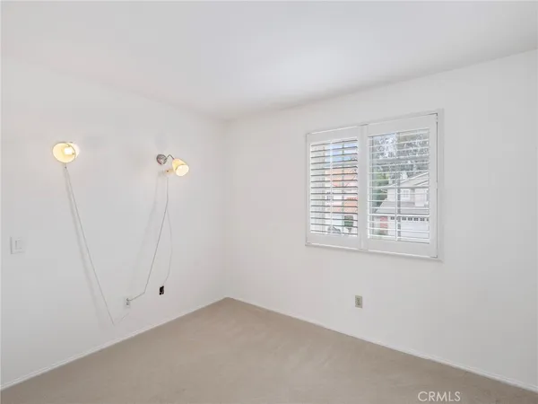 an empty room with sliding door