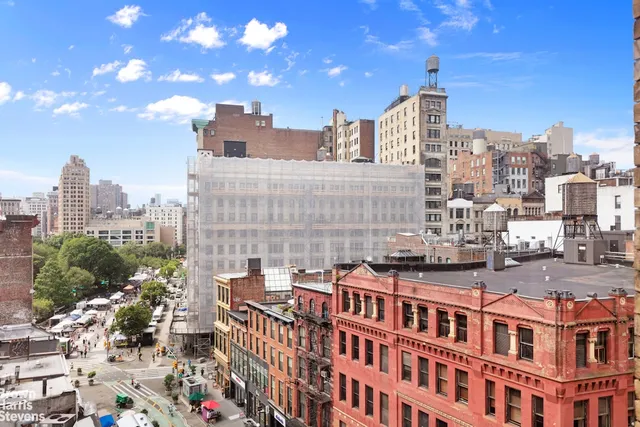 a view of a city with tall buildings