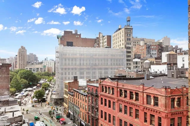 a view of a city with tall buildings