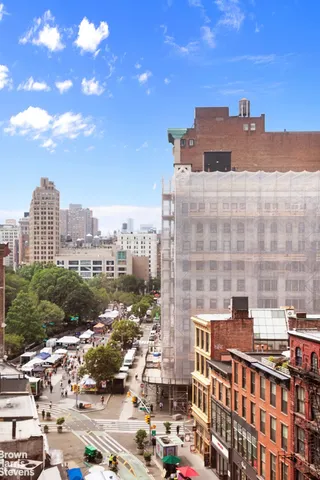 a view of a city with tall buildings