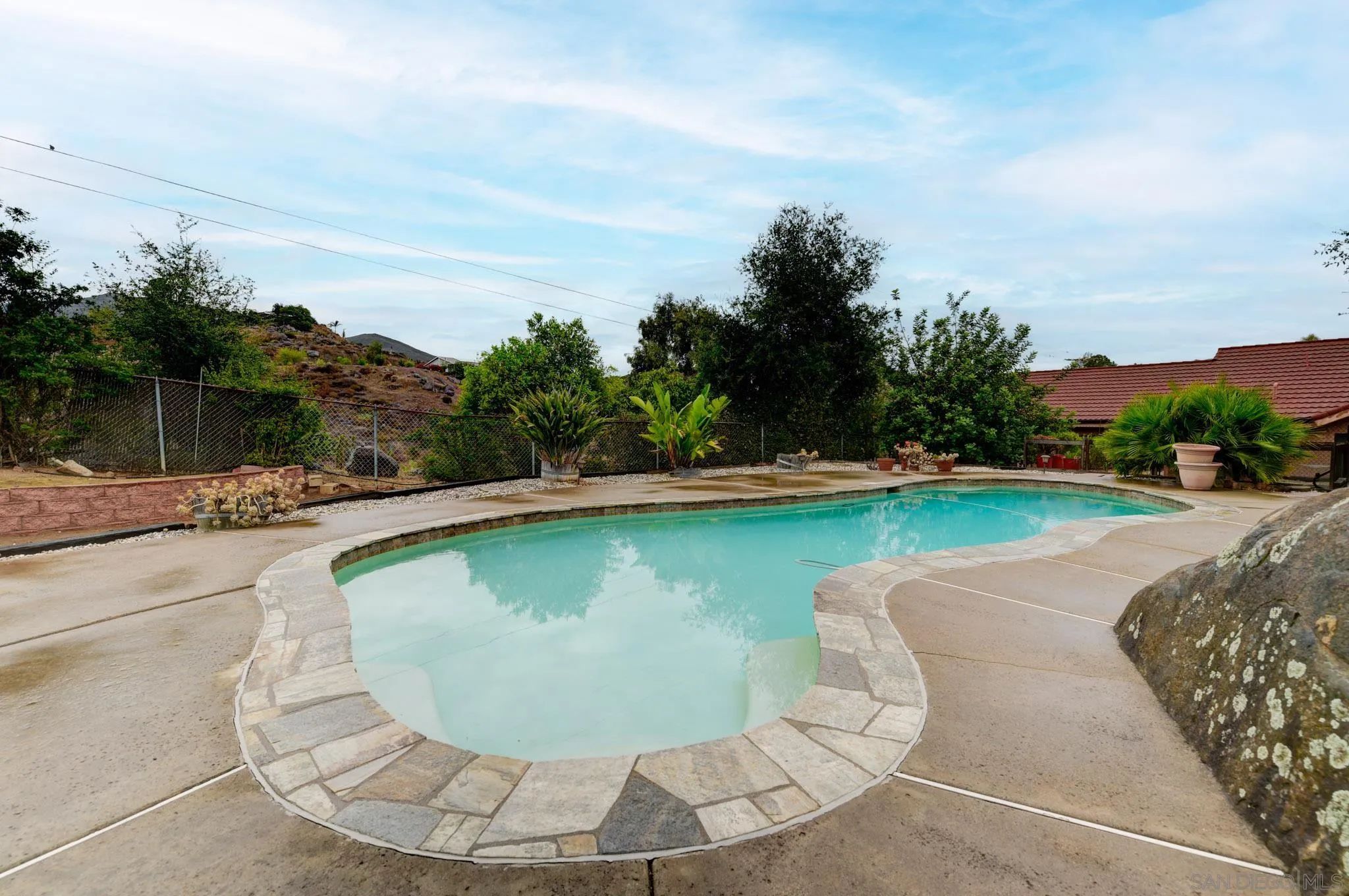 1961 Pine View Road Alpine, CA 91901 - Photo 11 of 35 a view of a swimming pool with a yard