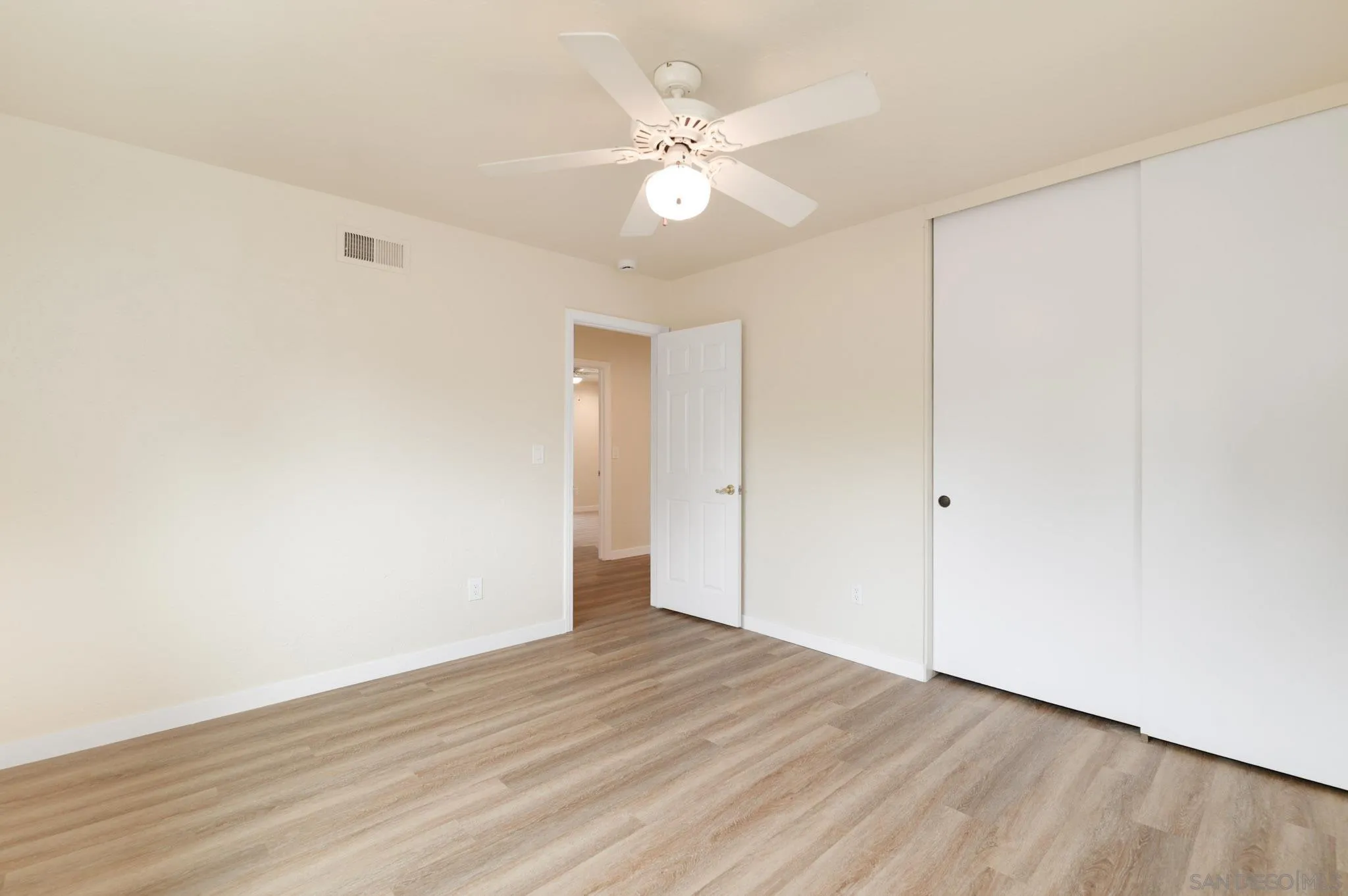 1961 Pine View Road Alpine, CA 91901 - Photo 22 of 35 a view of an empty room with wooden floor