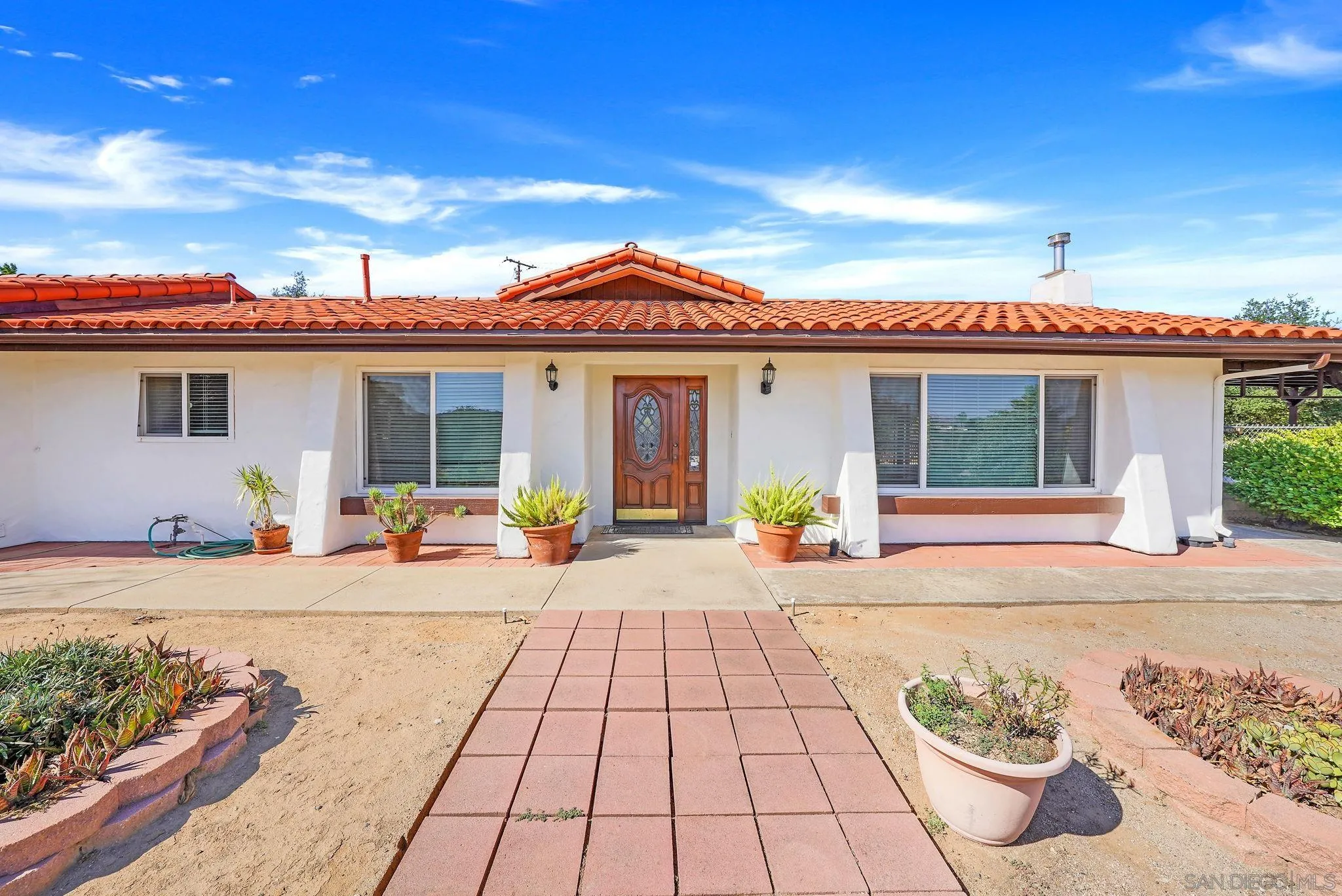1961 Pine View Road Alpine, CA 91901 - Photo 31 of 35 a front view of a house with a patio