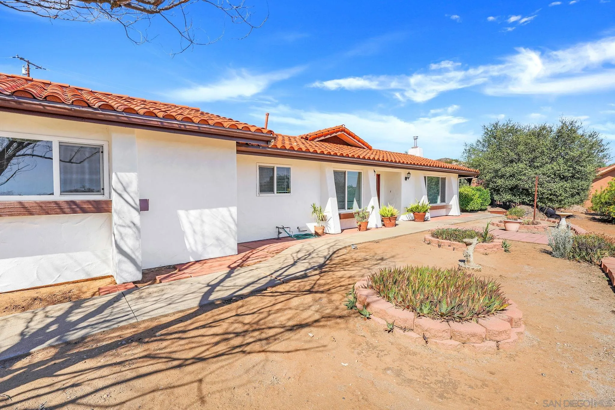 1961 Pine View Road Alpine, CA 91901 - Photo 32 of 35 a front view of a house with a patio