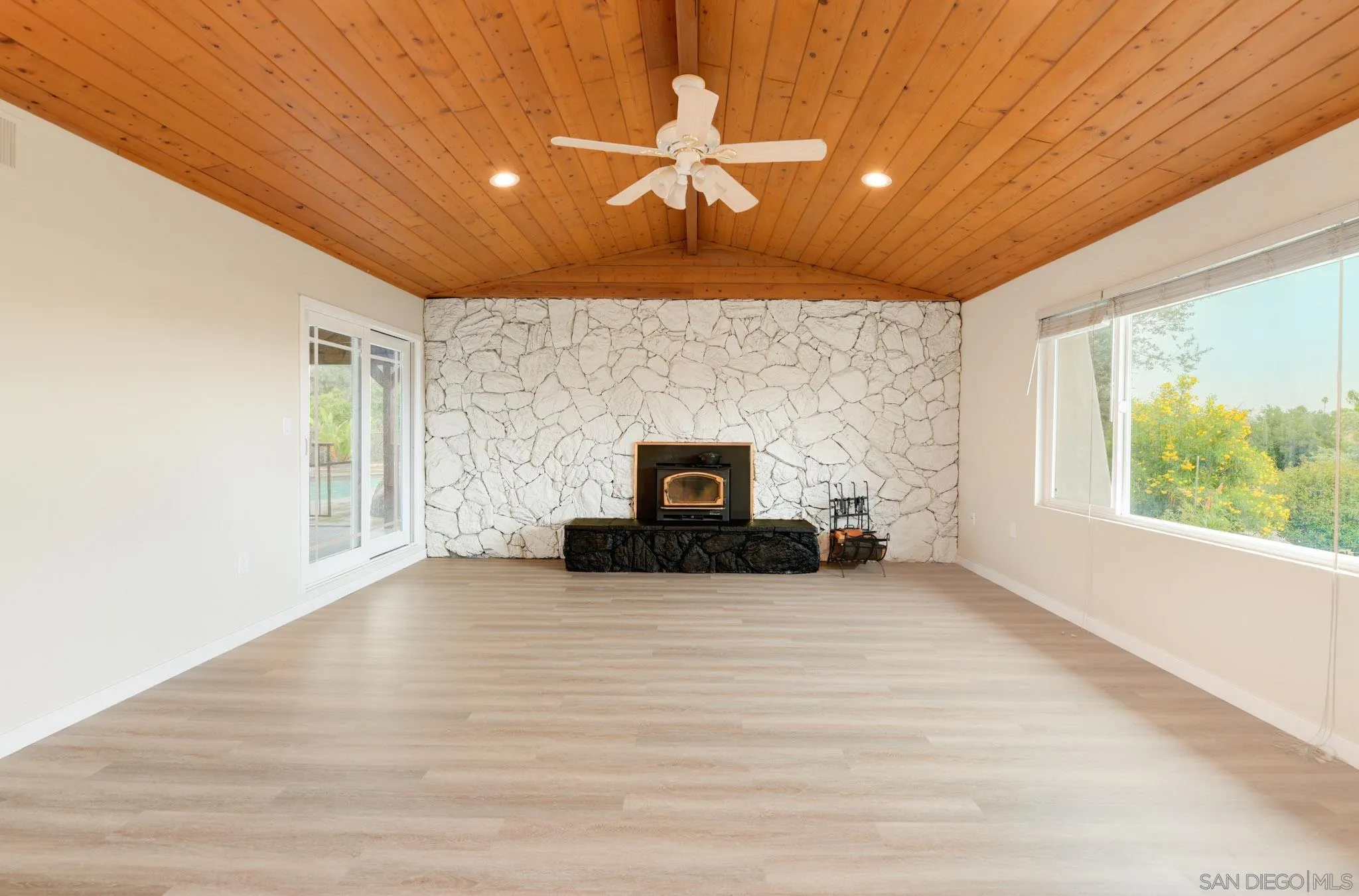 1961 Pine View Road Alpine, CA 91901 - Photo 4 of 35 a view of a livingroom with a fireplace and window