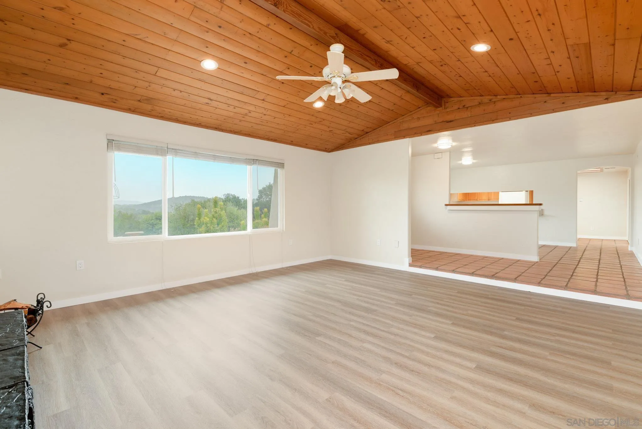 1961 Pine View Road Alpine, CA 91901 - Photo 5 of 35 wooden floor in an empty room with a window