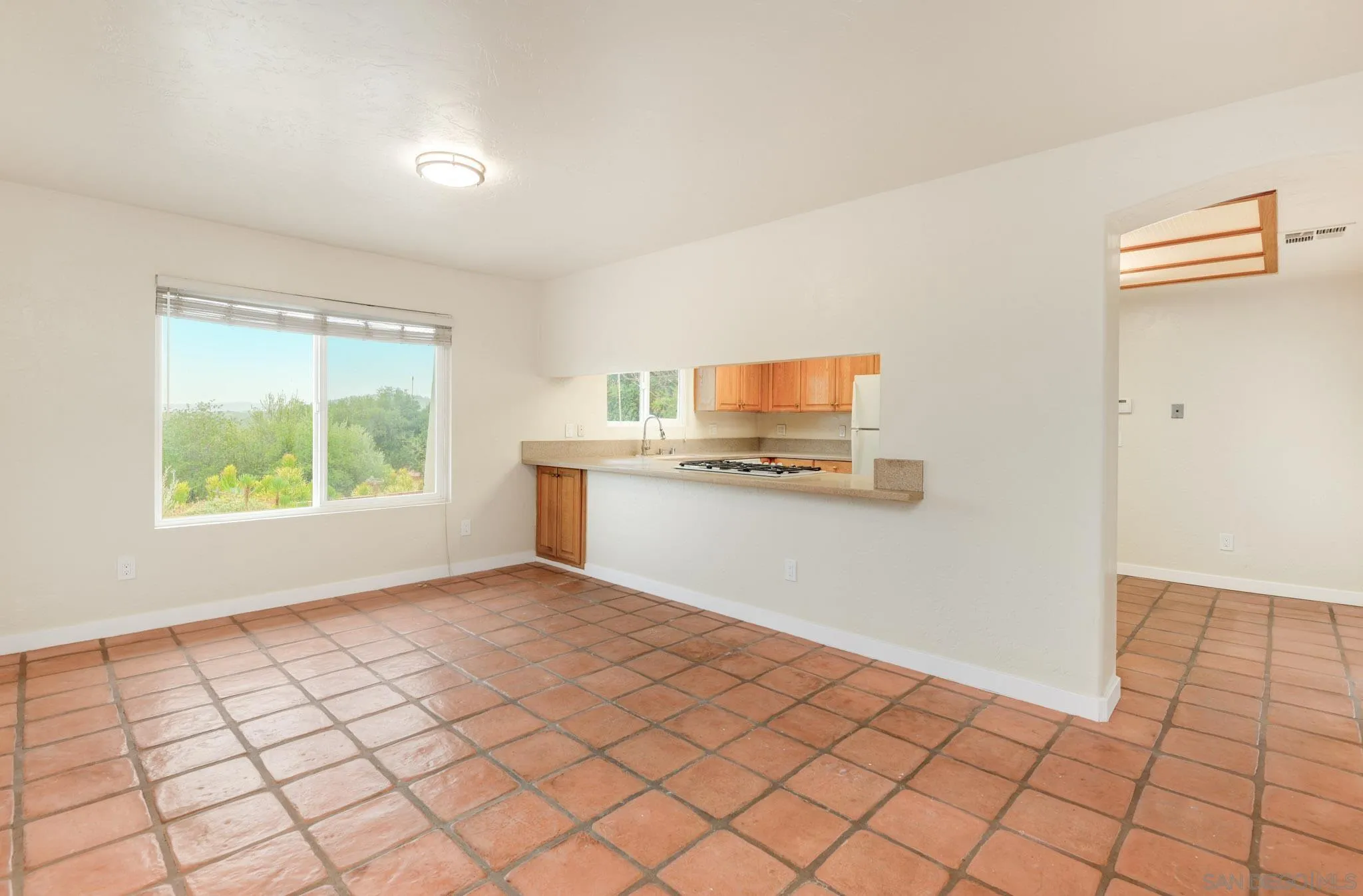 1961 Pine View Road Alpine, CA 91901 - Photo 6 of 35 a view of kitchen with microwave cabinets and window