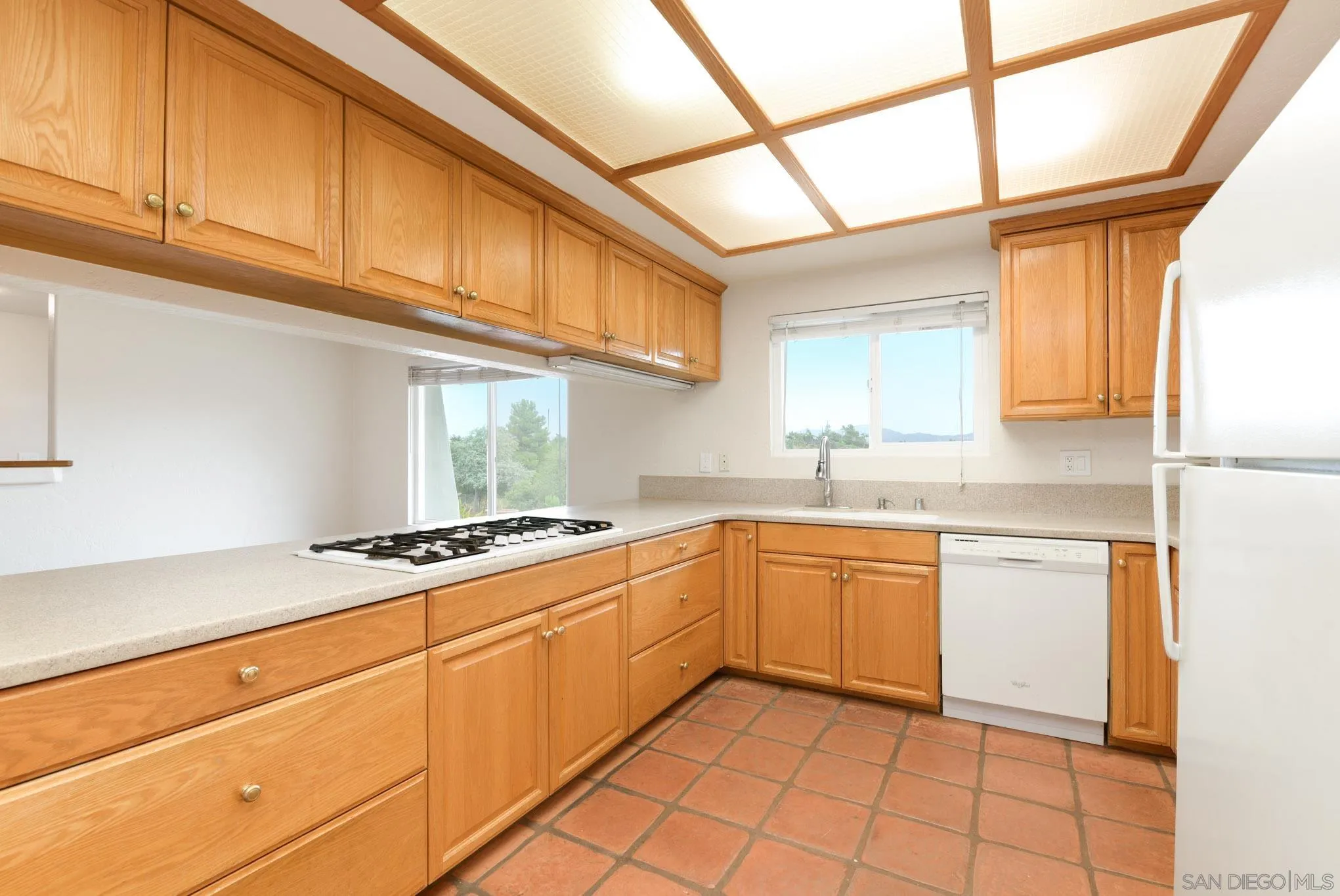 1961 Pine View Road Alpine, CA 91901 - Photo 8 of 35 a kitchen with stainless steel appliances granite countertop a sink and cabinets