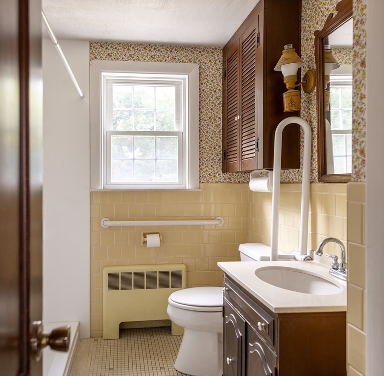 21 Ortins Road Hamilton, MA 01982 - Photo 11 of 16 a bathroom with a sink and a toilet
