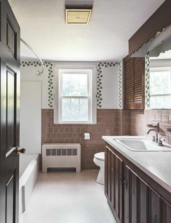 21 Ortins Road Hamilton, MA 01982 - Photo 12 of 16 a bathroom with a sink and a bathtub
