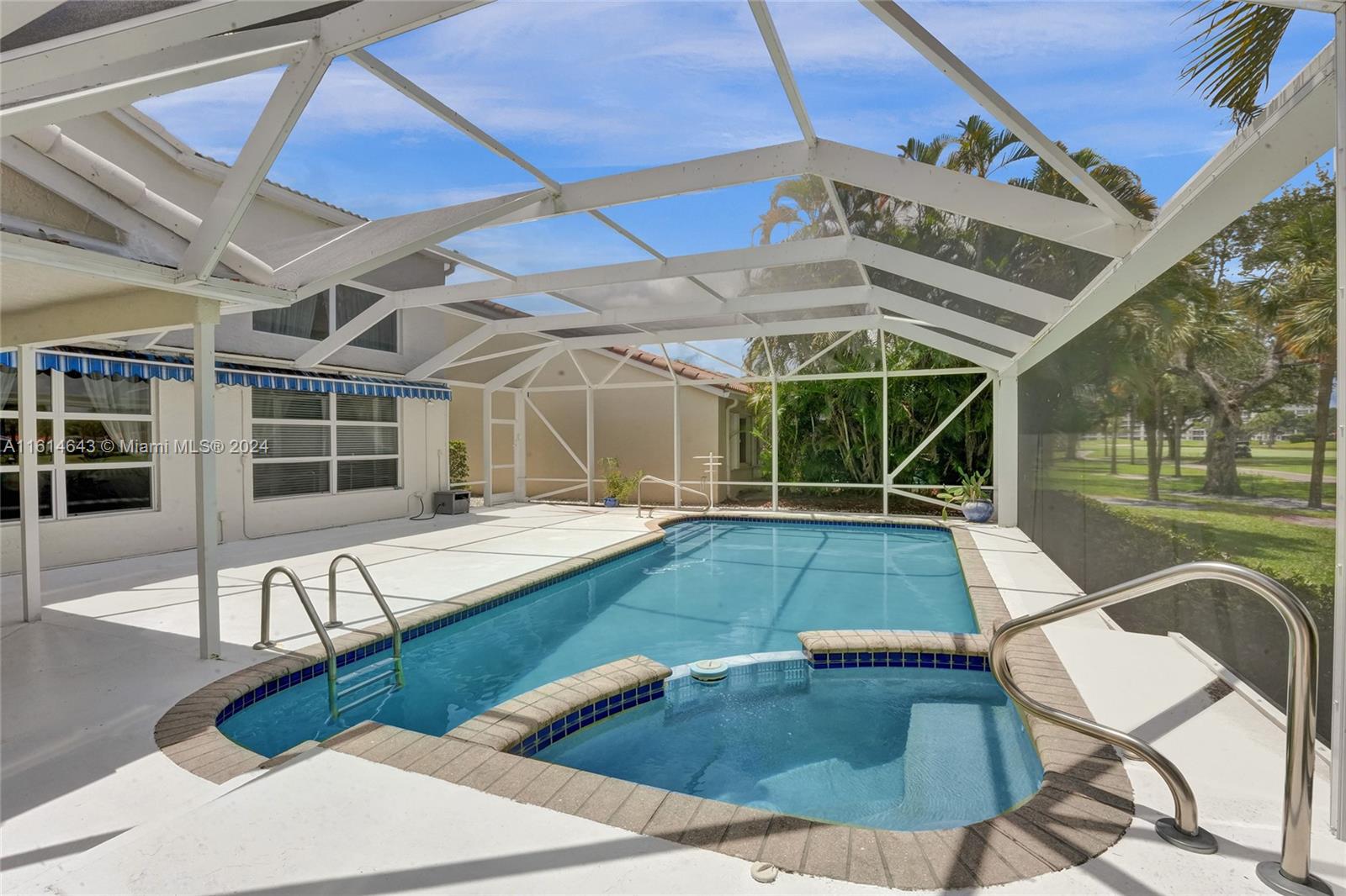 17269 Balboa Point Way Boca Raton, FL 33487 - Photo 16 of 41 a swimming pool with outdoor seating